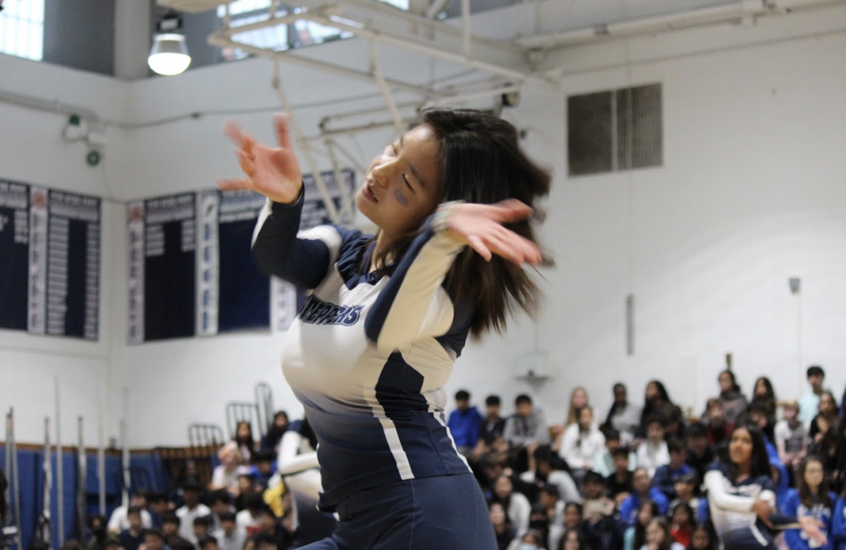 Senior Step Team member Isabella Chu performs in her final fall pep rally.